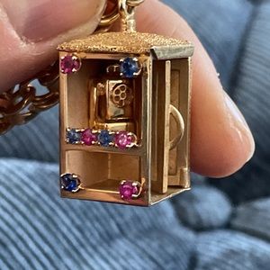 William Dankner 14K gold phone booth charm and bracelet.